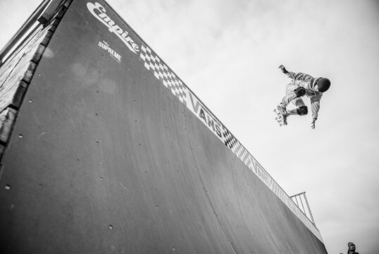 Louis Newman, alley-oop backside ollie at Wellington Ramp Riot.