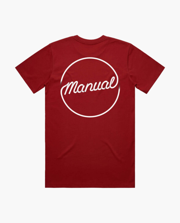A product photo of the Manual Diner t-shirt in cardinal red. Showing the back print.