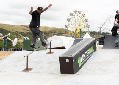 Chilla Corbs frontside boardslides during DuckBrewe 5 at the Rolling Meadows music festival.