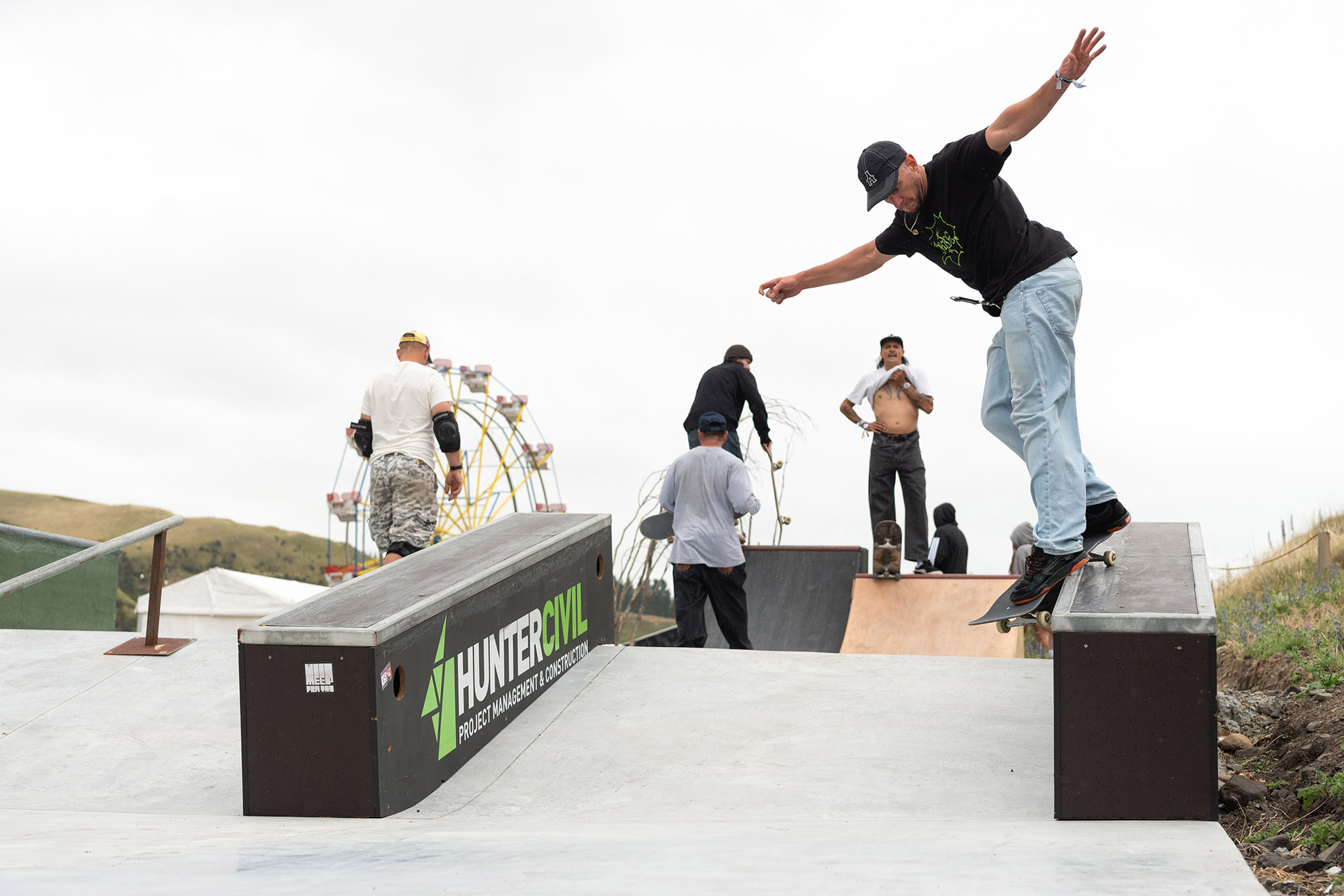 James Kingston backside Smith grinds during DuckBrewe 5 at the Rolling Meadows music festival.